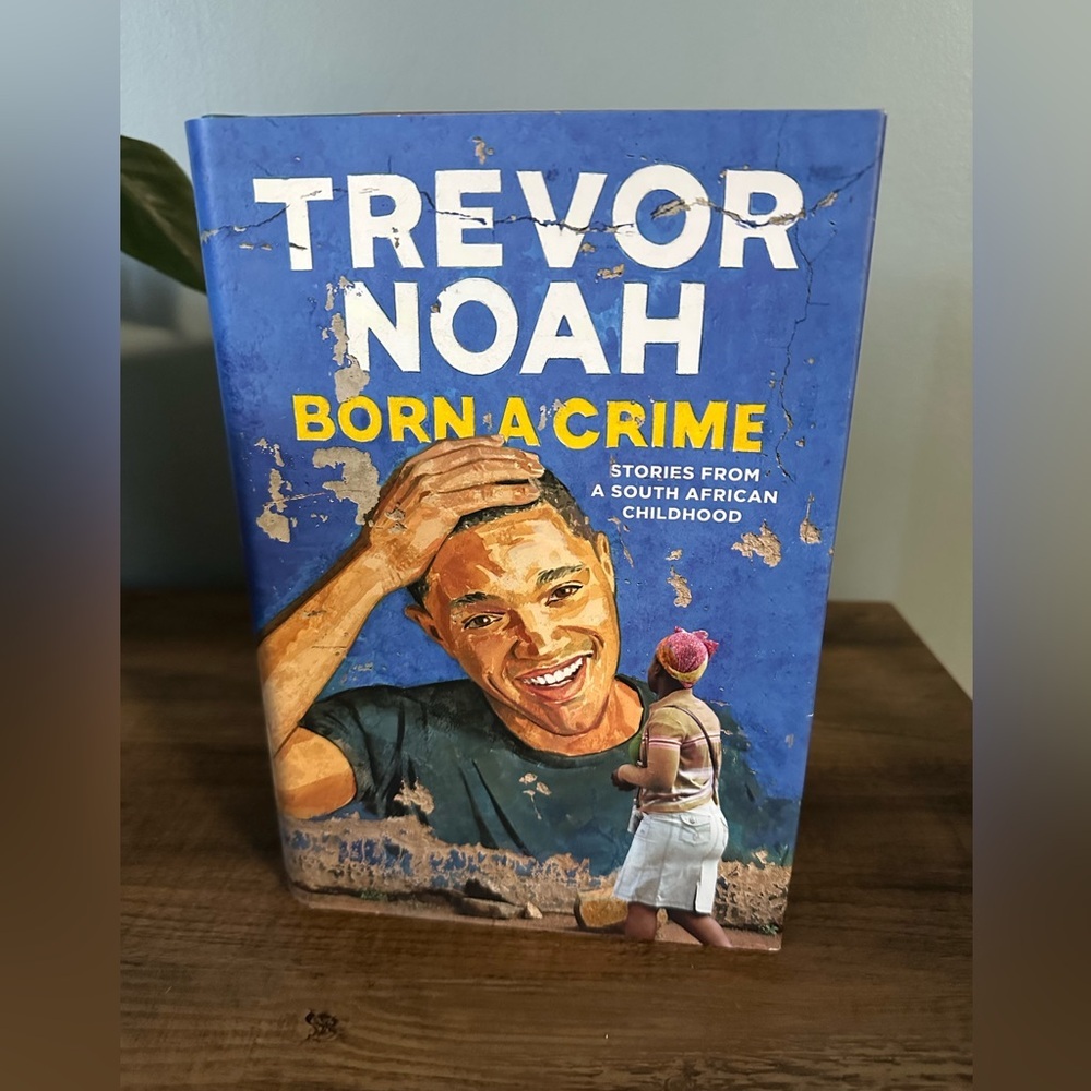Hardcover book, “Born a Crime” by Trevor Noah.